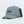 Load image into Gallery viewer, A light blue-gray baseball cap with a brown leather patch on the front that reads 'TODAE' and a black hangtag attached to the side, photographed on a clean white background.
