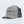 Load image into Gallery viewer, A light gray trucker cap with black mesh back panels and a black hangtag, featuring the brand name 'TODAE' printed on the front.
